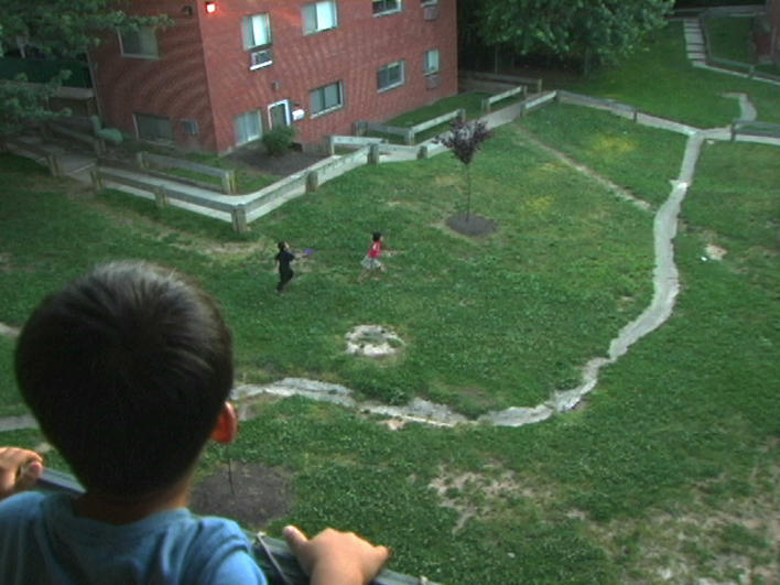 Children from Burma playing in courtyard