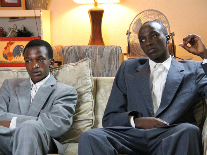 Congolese boys sitting on a couch